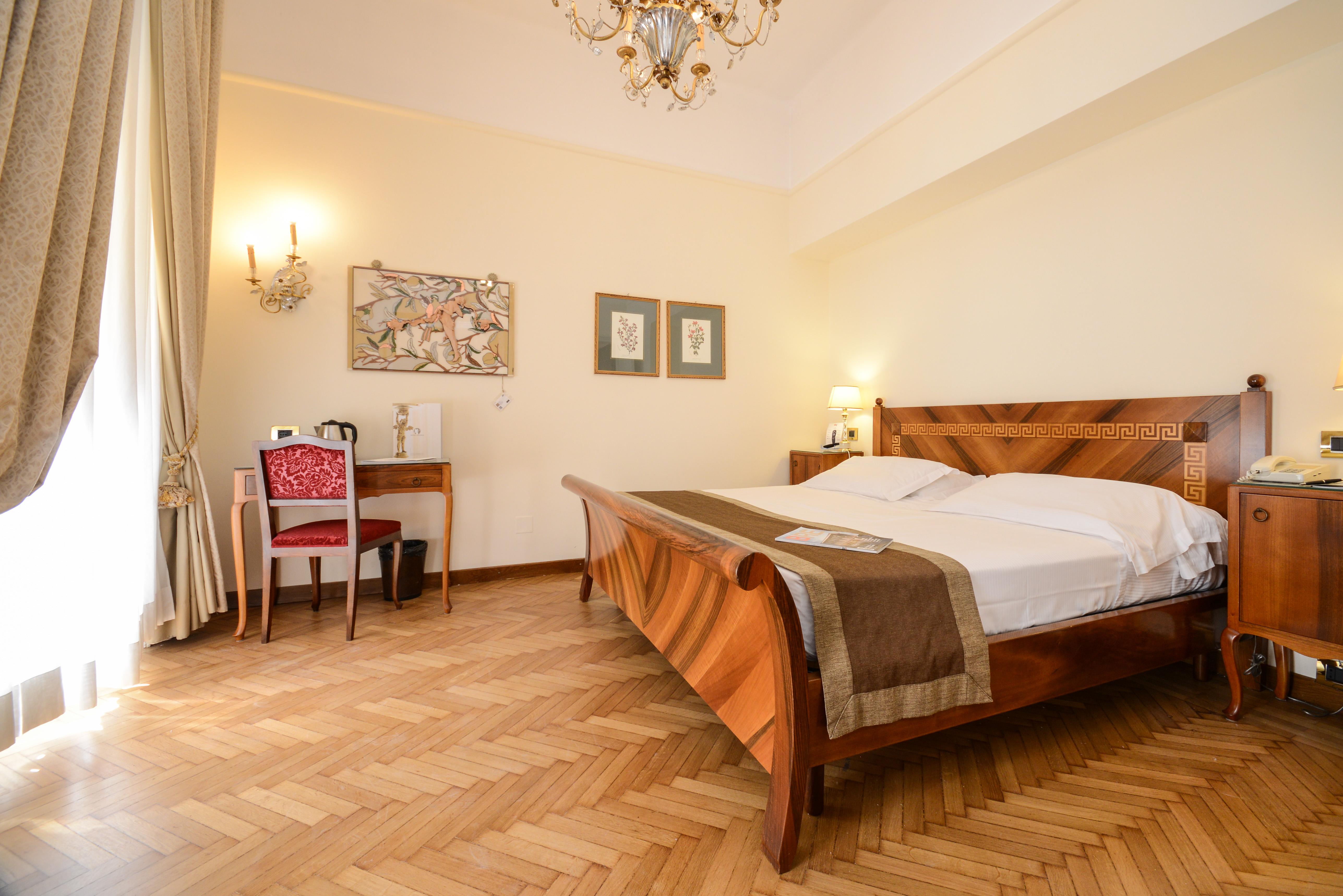 Hotel Vittoria Brescia Exterior foto A room at the hotel